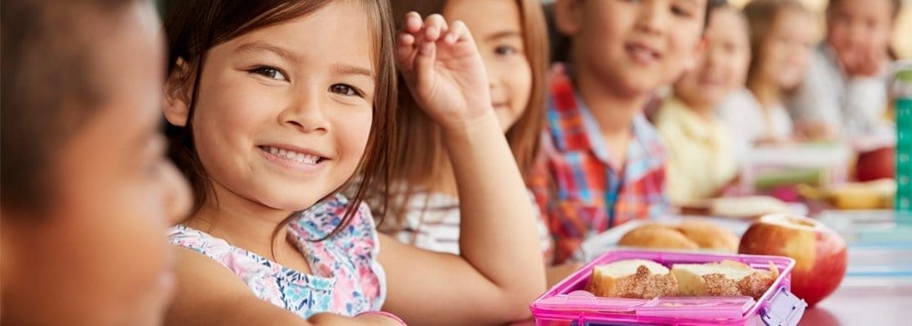 Children enjoying healthy lunchbox ideas for fussy kids