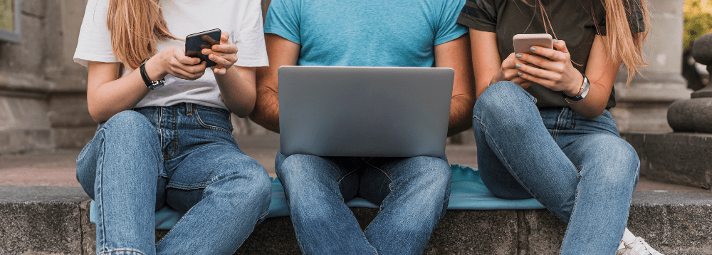 Teens on a computer keeping safe online